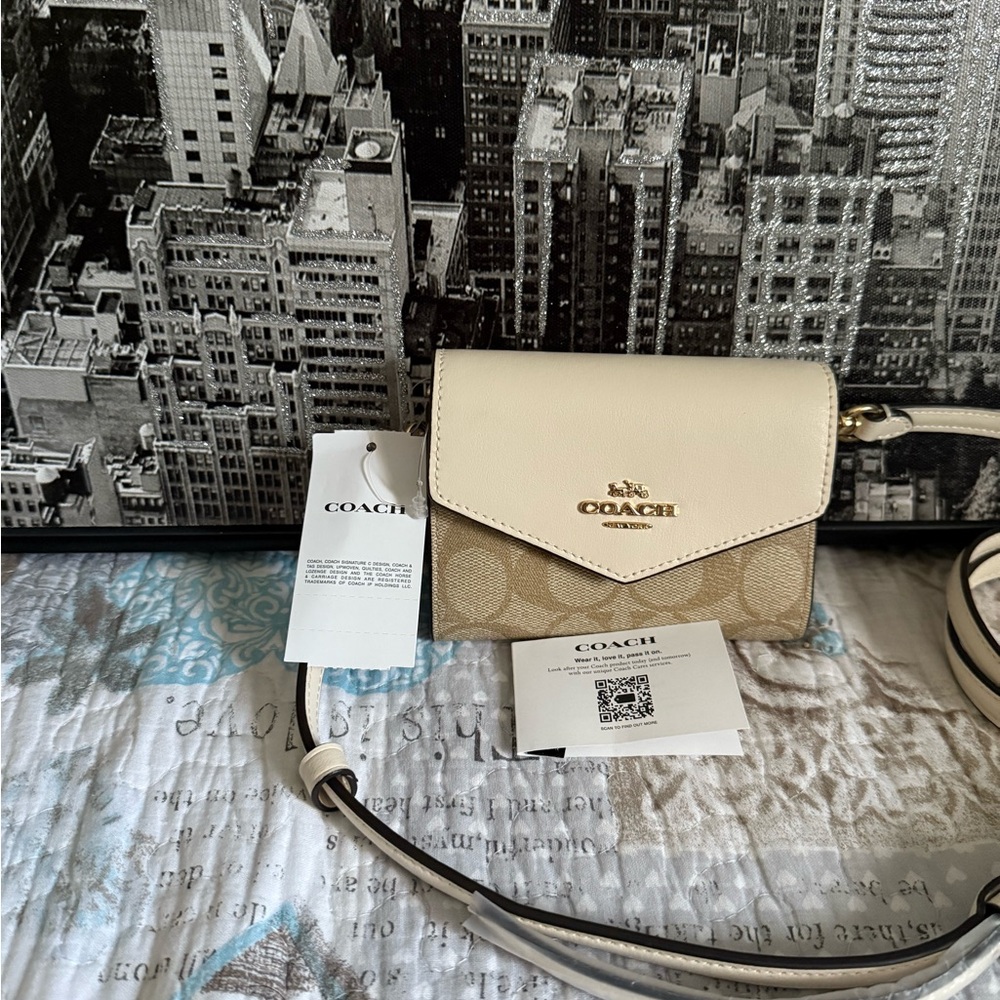 NWT Coach mini envelope wallet on strap - retail $198 - light khaki chalk.